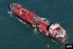 Kapal tanker MV Stena Immaculate tengah berlabuh di Laut Utara, di lepas pantai Withernsea, sebelah timur Inggris, 11 Maret 2025, setelah ditabrak kapal kontainer MV Solong, 10 Maret. (Paul ELLIS / AFP)