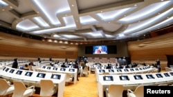 FILE - Sidang pleno Konferensi PBB di Jenewa, Swiss, 24 November 2020. (REUTERS/Denis Balibouse/Pool)