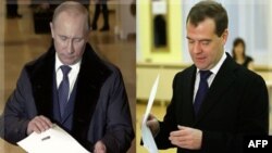 Bosh vazir Vladimir Putin va Prezident Dmitriy Medvedev saylov uchastkalarida. 4-dekabr 2011-yil, Moskva