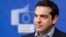 FILE - Greece's Prime Minister Alexis Tsipras addresses the media at the European Commission headquarters in Brussels, March 13, 2015. 