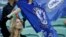 Une supportrice de Chelsea avant la finale de la Ligue Europa entre Arsenal et Chelsea au stade olympique de Bakou en Azerbaïdjan, le 29 mai 2019. (AP Photo/Luca Bruno)