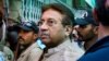 FILE - Pakistan's former President and military ruler Pervez Musharraf arrives at an anti-terrorism court in Islamabad, Pakistan, April 20, 2013. 