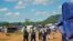 Zimbabwean police on patrol at the Chingwizi transit camp for over 20,000 people displaced as a result of the flooded Tokwe-Mukorsi Dam. (Photo: Human Rights Watch)