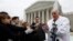 Indiana soybean farmer Vernon Bowman speaks to the media outside the Supreme Court in Washington, Feb. 19, 2013. 