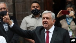 Mexico's President Andres Manuel Lopez Obrador thumbs up after voting in congressional, state and local elections in Mexico City, Sunday, June 6, 2021. Mexicans on Sunday were electing the entire lower house of Congress, almost half the country's…