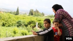 Mother-of-four Sobhiyeh and some of her family. (J. Owens for VOA)