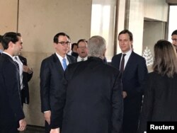 White House senior adviser Jared Kushner and Treasury Secretary Steven Mnuchin arrive at Manama's Four Seasons hotel, the venue for the U.S.-hosted "Peace to Prosperity" conference, in Manama, Bahrain, June 25, 2019.