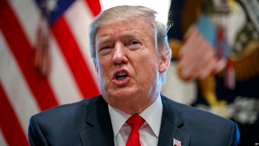 FILE - In this Feb. 1, 2019, photo, President Donald Trump speaks in the Cabinet Room of the White House in Washington. 