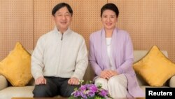 Japan's Crown Prince Naruhito and Crown Princess Masako pose for a photo at their residence, Togu Palace, in Tokyo, Feb. 17, 2019.