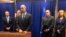 U.S. Attorney John Anderson, center at podium, speaks about the investigation into a former New Mexico priest who is accused of sex abuse, at a news conference in Albuquerque, N.M., Sept. 21, 2018. A federal judge decided Tuesday that Arthur Perrault will remain in prison to await trial on the charges.