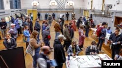 Voters cast their ballots at Maryland Avenue Montessori School during Wisconsin's Supreme Court election in Milwaukee, Wisconsin, April 4, 2023.