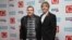 FILE - Meat Loaf (left) and Andrew Polec pose for photographers upon arrival for the Q Music Awards, at the Camden Roundhouse in London, Nov. 2, 2016. 