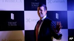 FILE - The eldest son of U.S. President Donald Trump, Donald Trump Jr. waves to media as he arrives for a meeting in Kolkata, India, Feb. 21, 2018. 
