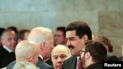 El presidente en disputa de Venezuela, Nicolás Maduro, y el entonces vicepresidente de EE.UU., Joe Biden,coincidieron en Brasilia durante la toma de posesión de Dilma Rousseff, el 1 de enero de 2015.