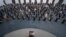 FILE - Syrian President Bashar al-Assad addresses the parliament, in Damascus, Syria, Aug. 12, 2020.