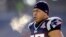 FILE - In this Jan. 10, 2010, photo, NFL linebacker Junior Seau is seen warming up before a game in Foxborough, Mass. Seau, who committed suicide in 2012, was found to have CTE, which has depression among its symptoms.