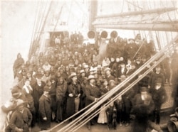 Photo shows Buffalo Bill's Wild West show performers and their families aboard the S.S. State of Nebraska bound for the show's first tour of England, March 31, 1887.