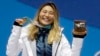 FILE - women's halfpipe gold medalist Chloe Kim, of the United States, poses during the medals ceremony at the 2018 Winter Olympics, in Pyeongchang, South Korea, Feb. 13, 2018.