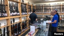 Firearms and accessories are seen on display at Gun City gunshop in Christchurch, New Zealand, March 19, 2019. 