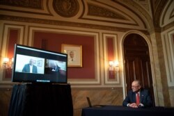 Senate Minority Leader Chuck Schumer, D-NY, speaks virtually with retired U.S. General Lloyd Austin, nominated by President-elect Joe Biden to be his Secretary of Defense, at the Capitol in Washington, Dec. 15, 2020.