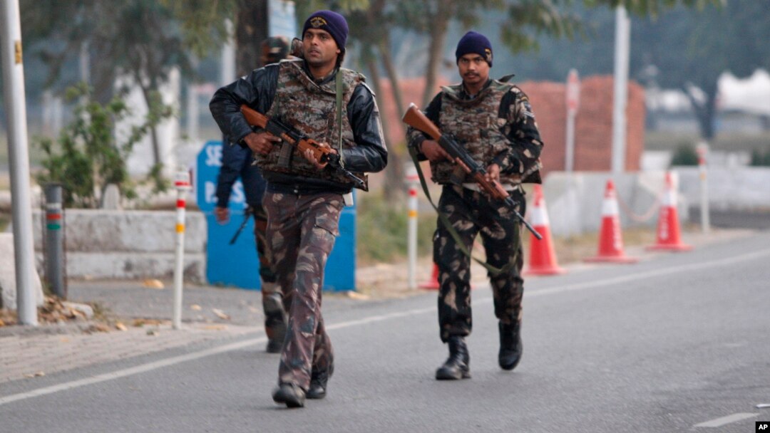 Indian security forces patrol inside the Indian air force base that came under attack Saturday in Pathankot, India, Jan. 3, 2016.