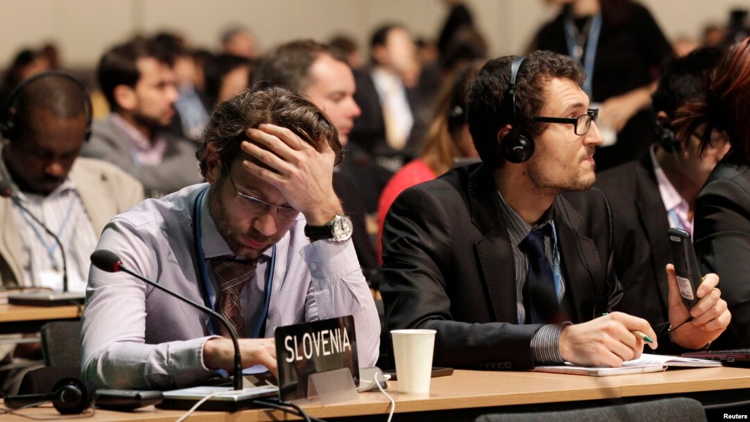 FILE - Delegates attend the closing session of the 19th conference of the U.N. Framework Convention on Climate Change (COP19) in Warsaw, Nov. 22, 2013. In December 2018, Poland will host the annual U.N. climate talks for the third time.