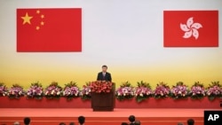 El presidente chino, Xi Jinping, pronuncia un discurso en un acto de inauguración del nuevo gobierno de Hong Kong y el 25 aniversario del traspaso del territorio de Gran Bretaña a China, el 1 de julio de 2022.