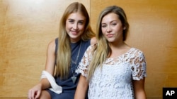 Maddie Marlow, left, and Tae Dye, of Maddie & Tae, pose for a portrait at Love Shack Studio in Nashvile, Tennessee, Aug. 27, 2015. 