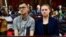 FILE: U.S. couple Nicholas Spencer and his wife Mackenzie Leigh Mathias Spencer, both 32, charged with torturing a 10-year old John Kayima, sit in a courtroom as they were freed on bail by a court in Kampala, Uganda, March 22, 2023.