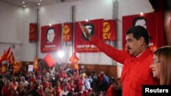 Nicolas Maduro lors d’une rencontre les membres du parti communiste à Caracas, au Venezuela le 26 février 2018. Miraflores Palace/ REUTERS 