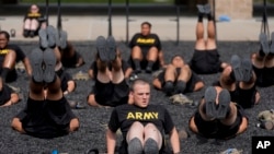 FILE - New recruits participate in the Army's future soldier prep course that gives lower-performing recruits up to 90 days of academic or fitness instruction to help them meet military standards, at Fort Jackson, in Columbia, S.C., Sept. 25, 2024.