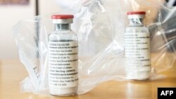 FILE - Vials of the drug remdesivir are seen at a hospital in Germany, April 8, 2020.