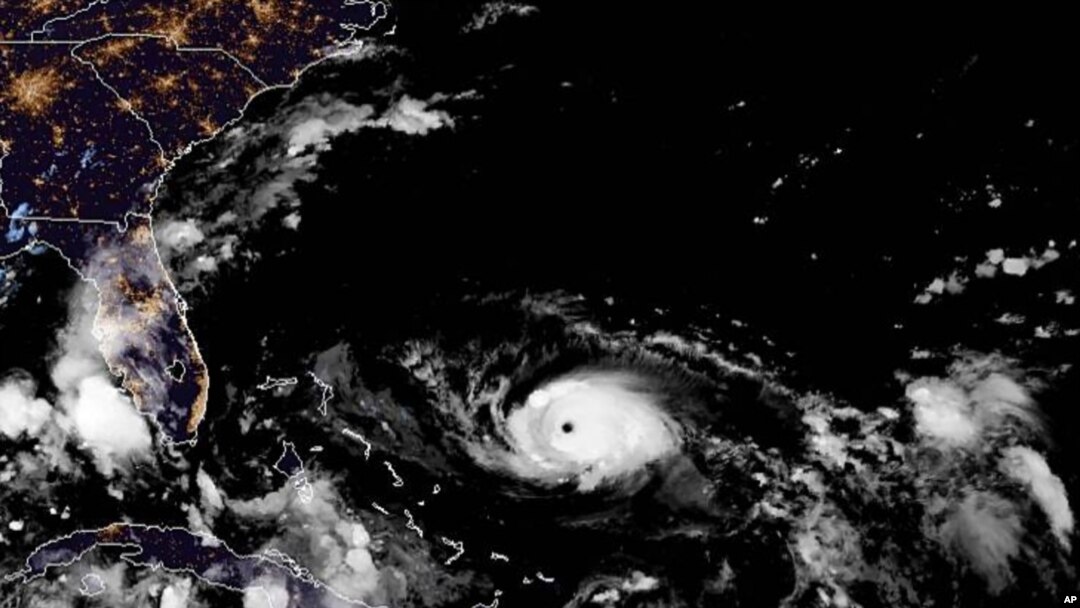 This photo provided by the National Oceanic and Atmospheric Administration shows a satellite view of Hurricane Dorian, taken at 10:00 p.m. EDT, Aug. 30, 2019.