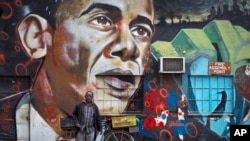 A mural of President Barack Obama, created by the Kenyan graffiti artist Bankslave, at the GoDown Arts Centre in Nairobi, July 22, 2015.