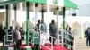 Nigeria's President Bola Ahmed Tinubu, center right, and Indian Prime Minister Narendra Modi stand on the podium before a meeting, at the Presidential Villa, in Abuja, Nigeria, Nov. 17, 2024. 