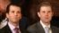 FILE - U.S. President Donald Trump's sons Donald Trump Jr. (L) and Eric Trump sit in the audience waiting to watch their father announce his nominee for the empty associate justice seat at the U.S. Supreme Court, at the White House in Washington, D.C., Jan. 31, 2017. 