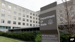 FILE - In this Dec. 15, 2014 file photo, the State Department in Washington. U.S. officials say the Trump administration is proposing deep cuts in funding for diplomacy and foreign aid to help pay for increased military spending. (AP Photo/Luis M…