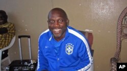 FILE - Liberian soccer star George Weah in Monrovia, Liberia, Aug. 10, 2014. 