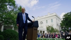 President Donald Trump leaves after an event about coronavirus testing strategy, in the Rose Garden of the White House, Sept. 28, 2020, in Washington. 