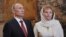 Vladimir Putin (L) is seen with his his then wife Lyudmila at a church service in Moscow, May 7, 2012.
