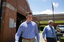 Atlanta Police Officer Devin Brosnan walks out following his release from the Fulton County Jail on June 18, 2020, in Atlanta. Authorities have charged Brosnan with four counts, including aggravated assault, in the shooting death of Rayshard Brooks.