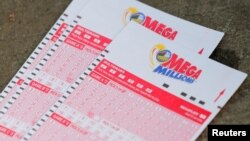 FILE - Mega Millions lottery tickets are seen in New York City, Oct. 23, 2018.