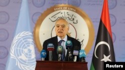 FILE - The U.N. envoy for Libya, Ghassan Salame, speaks during a news conference in Tripoli, Libya, April 6, 2019.