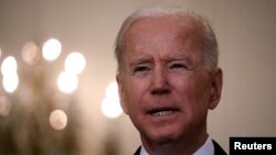 El presidente Joe Biden, desde la Casa Blanca, anuncia que Estados Unidos compartirá 80 millones de vacunas con otros países, el 17 de mayo de 2021.