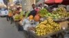 India's informal sector includes many workers selling fruits, vegetables and other wares. 