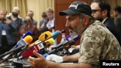 Armenian opposition leader Nikol Pashinyan speaks during a news conference in Yerevan, Armenia, April 24, 2018. 