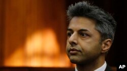 British businessman Shrien Dewani, accused of orchestrating the killing of his wife, Anni Dewani, appears in the high court in Cape Town, South Africa, Oct. 6, 2014. 