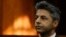 British businessman Shrien Dewani, accused of orchestrating the killing of his wife, Anni Dewani, appears in the high court in Cape Town, South Africa, Oct. 6, 2014. 