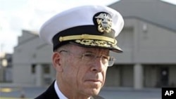 Adm. Michael Mullen, Chairman of the Joint Chiefs of Staff at Dover Air Force Base, Del., 15 Oct 2010