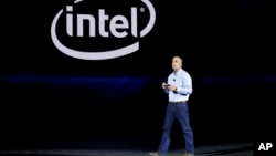 Intel CEO Brian Krzanich delivers a keynote speech at CES International, Jan. 8, 2018, in Las Vegas. 